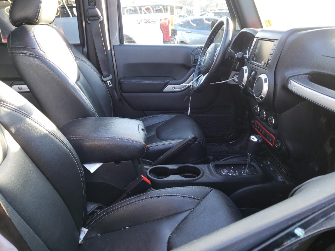 Photo 5 from auction – 2016 JEEP WRANGLER U with VIN 1C4HJWFG2GL337463