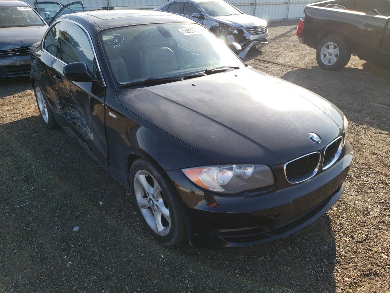 BMW 128 I 2011 with VIN WBAUP7C59BVP21997 - Photo from auction