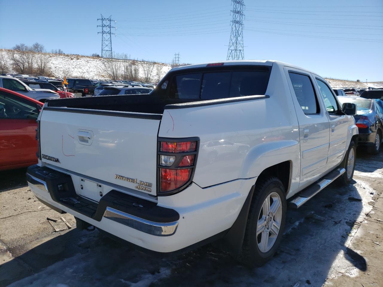 Photo 4 from auction – 2012 HONDA RIDGELINE with VIN 5FPYK1F58CB458534