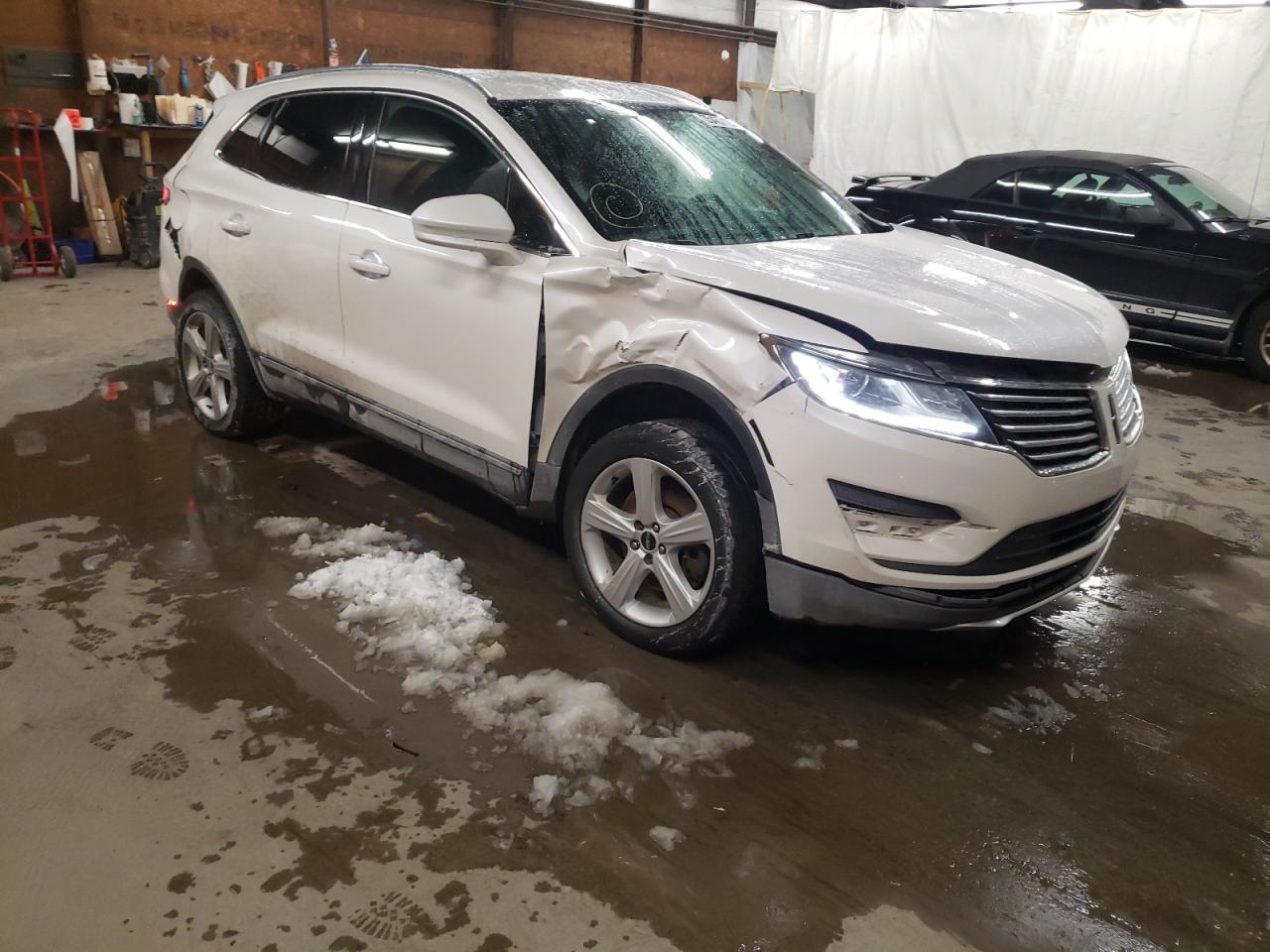Photo 9 from auction – 2015 LINCOLN MKC with VIN 5LMCJ2A93FUJ45076