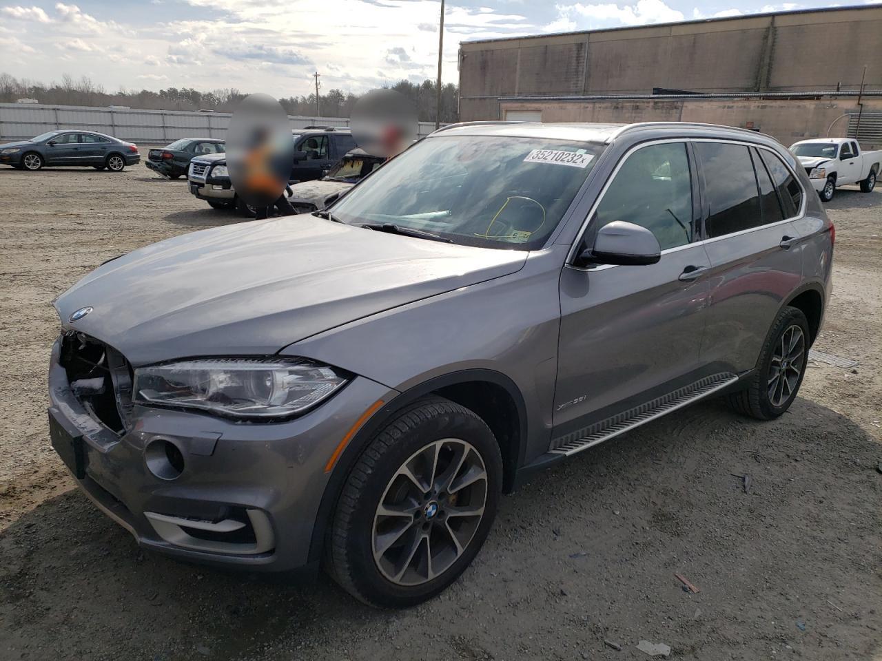Photo 2 from auction – 2015 BMW X5 XDRIVE3 with VIN 5UXKR0C5XF0K65635