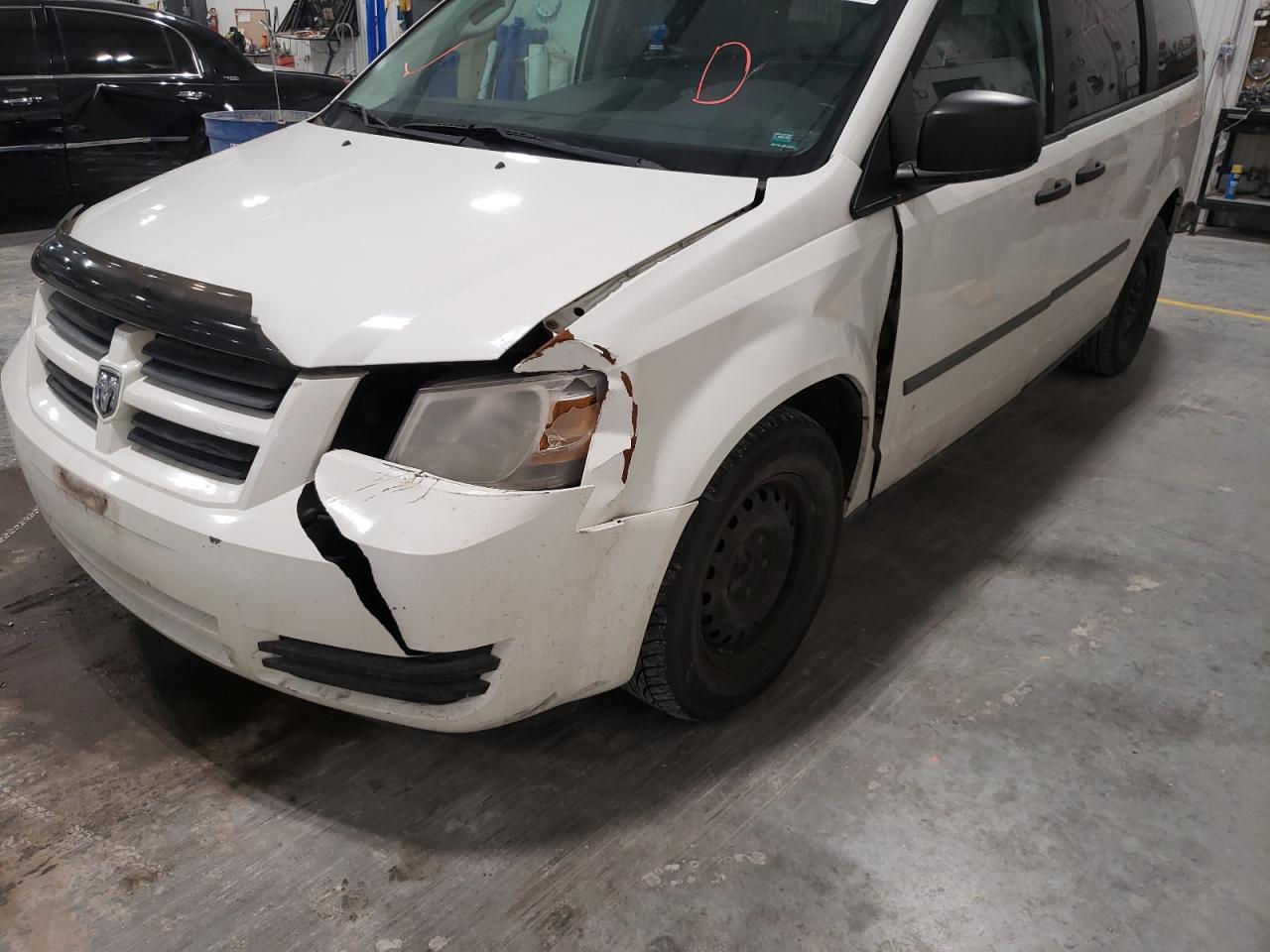 Photo 9 from auction – 2010 DODGE GRAND CARA with VIN 2D4CN1AE5AR352242