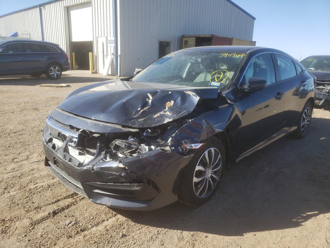 Photo 2 from auction – 2016 HONDA CIVIC LX with VIN 19XFC2F52GE082086