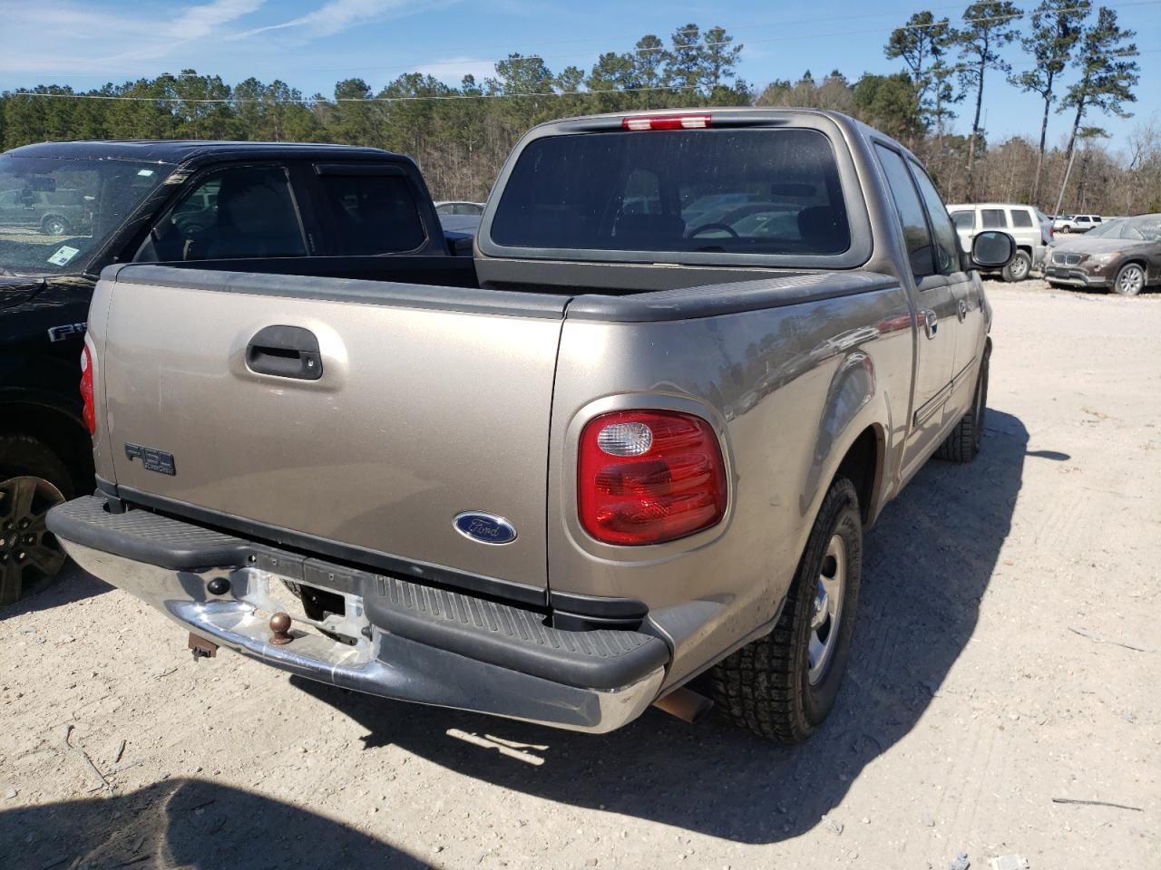 Photo 4 from auction – 2002 FORD F150 SUPER with VIN 1FTRW07652KD85532