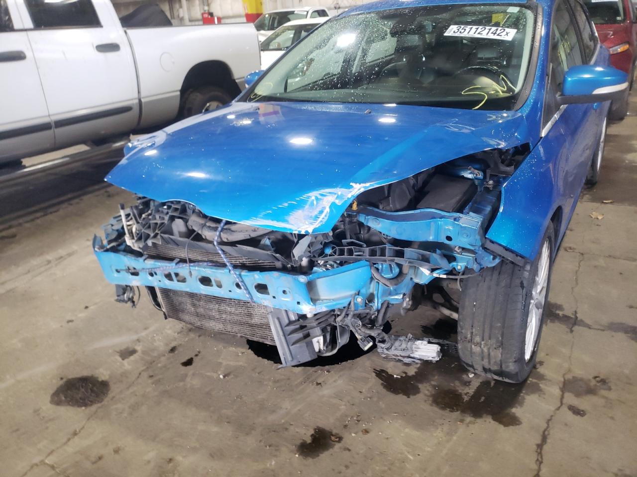 Photo 9 from auction – 2012 FORD FOCUS SEL with VIN 1FAHP3M26CL155902