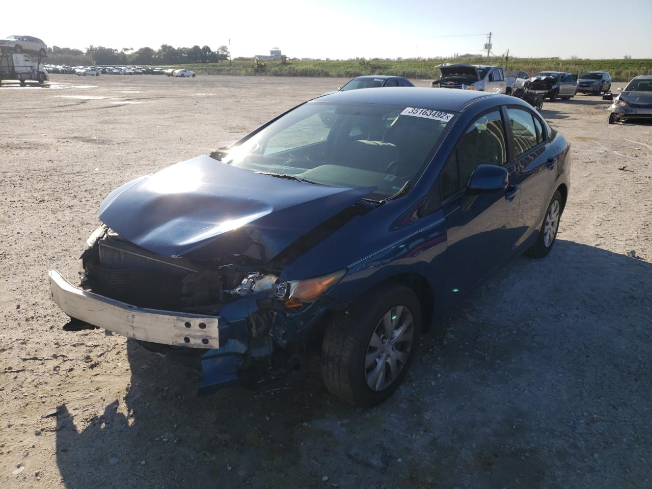 Photo 2 from auction – 2012 HONDA CIVIC LX with VIN 19XFB2F58CE035433