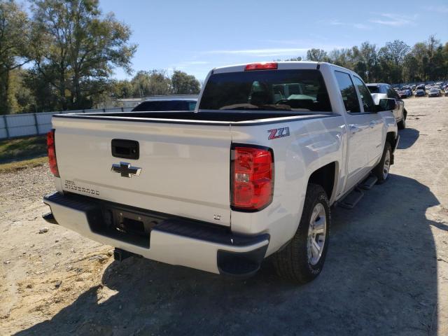 Photo 4 from auction – 2018 CHEVROLET SILVERADO with VIN 3GCUKREC2JG559615