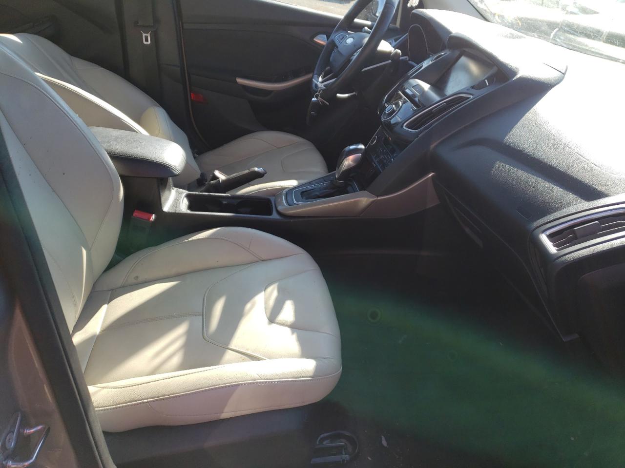 Photo 5 from auction – 2015 FORD FOCUS TITA with VIN 1FADP3J28FL209918