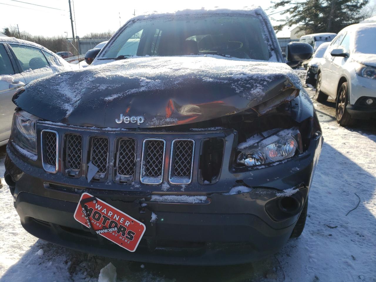 Photo 9 from auction – 2014 JEEP COMPASS LA with VIN 1C4NJDEB2ED817362