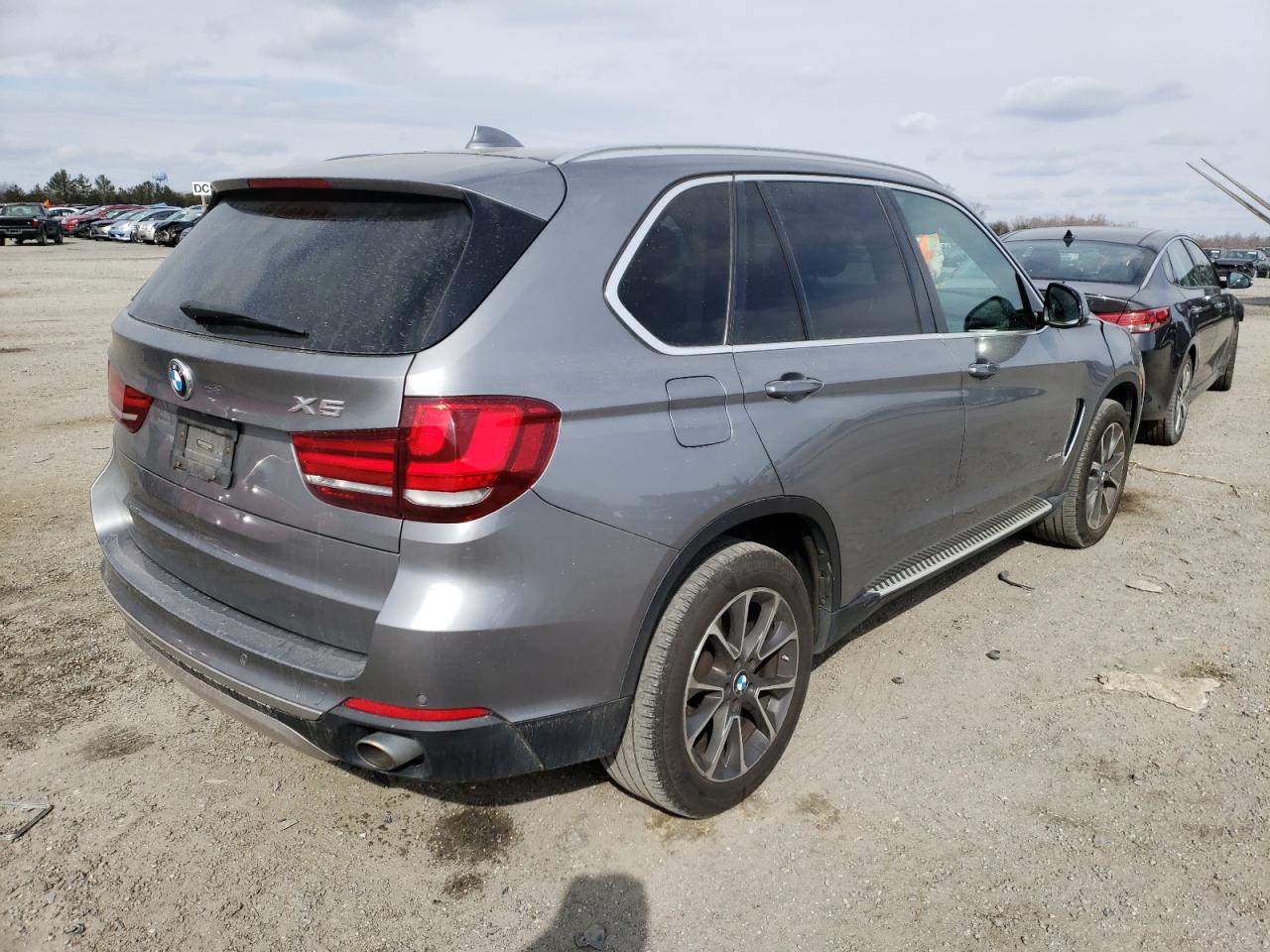 Photo 4 from auction – 2015 BMW X5 XDRIVE3 with VIN 5UXKR0C5XF0K65635