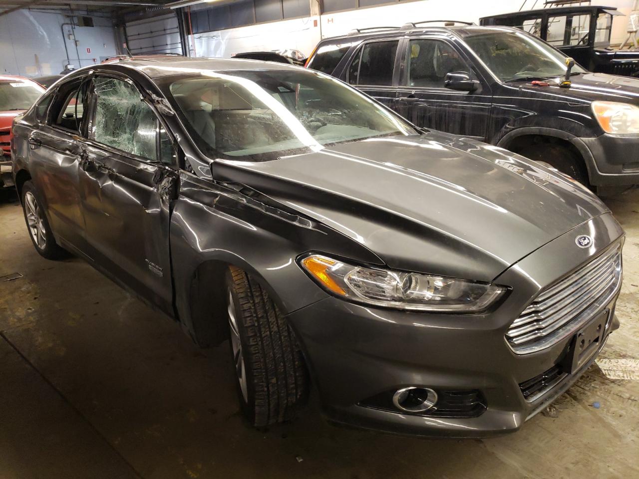 FORD FUSION TIT 2016 with VIN 3FA6P0SU8GR191480 - Photo from auction