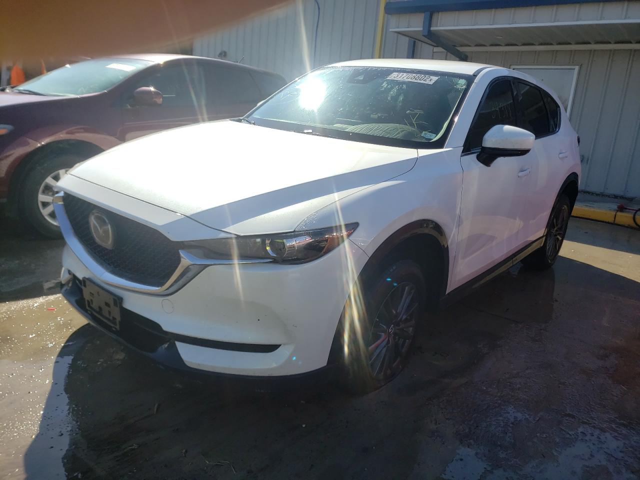 Photo 2 from auction – 2019 MAZDA CX-5 TOURI with VIN JM3KFACM8K0617118