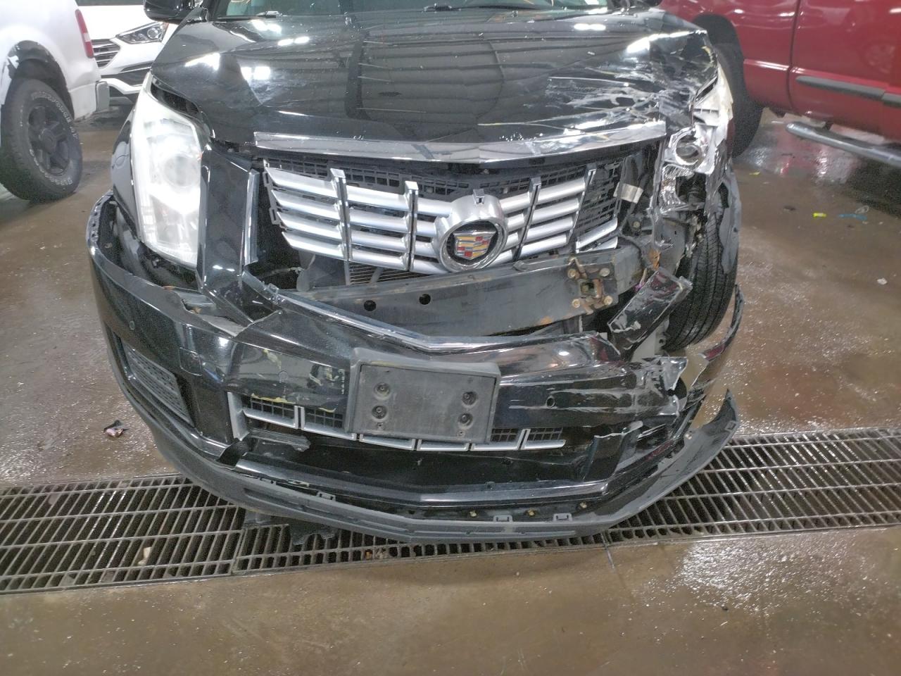 Photo 9 from auction – 2014 CADILLAC SRX LUXURY with VIN 3GYFNEE33ES637244