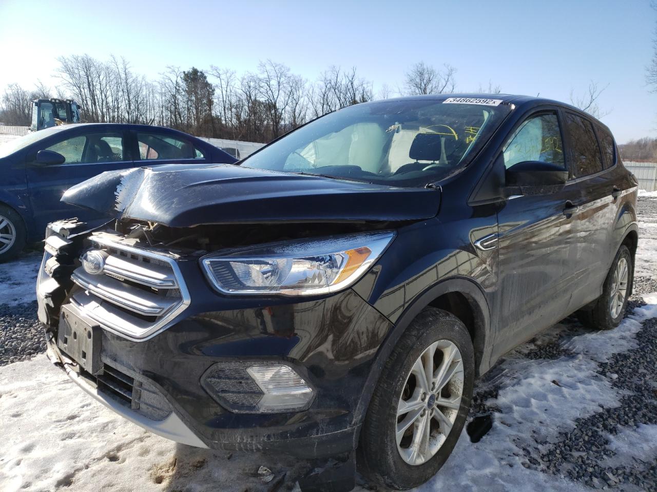 Photo 2 from auction – 2017 FORD ESCAPE SE with VIN 1FMCU9GD2HUD02615