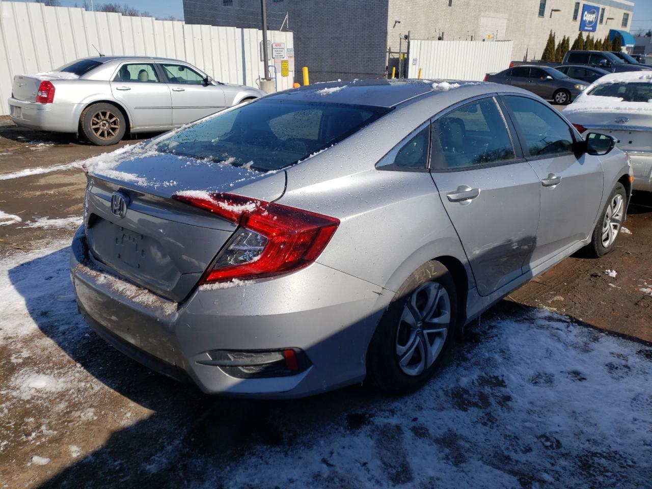 Photo 4 from auction – 2016 HONDA CIVIC LX with VIN 2HGFC2F51GH569575