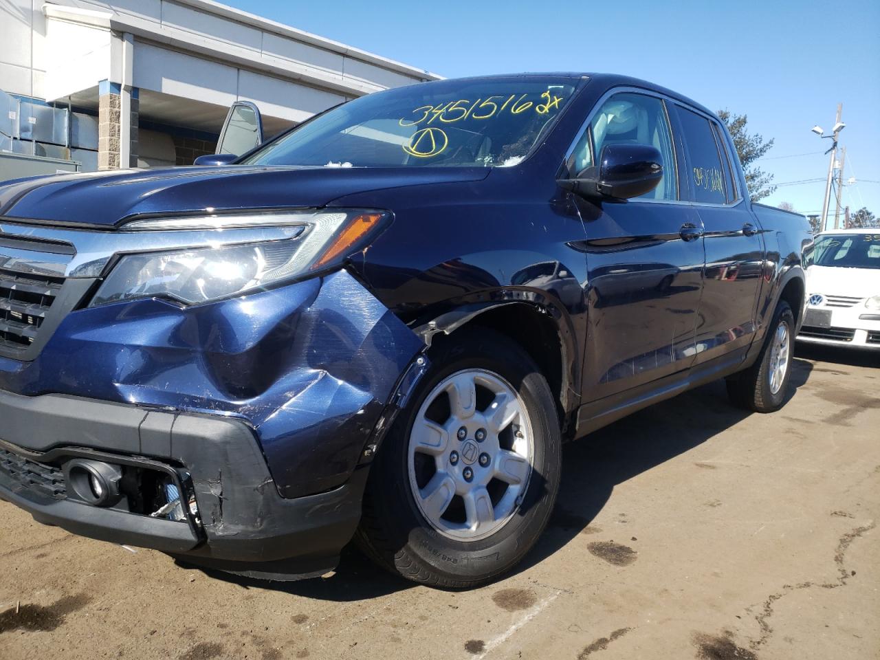 Photo 9 from auction – 2017 HONDA RIDGELINE with VIN 5FPYK3F61HB023110