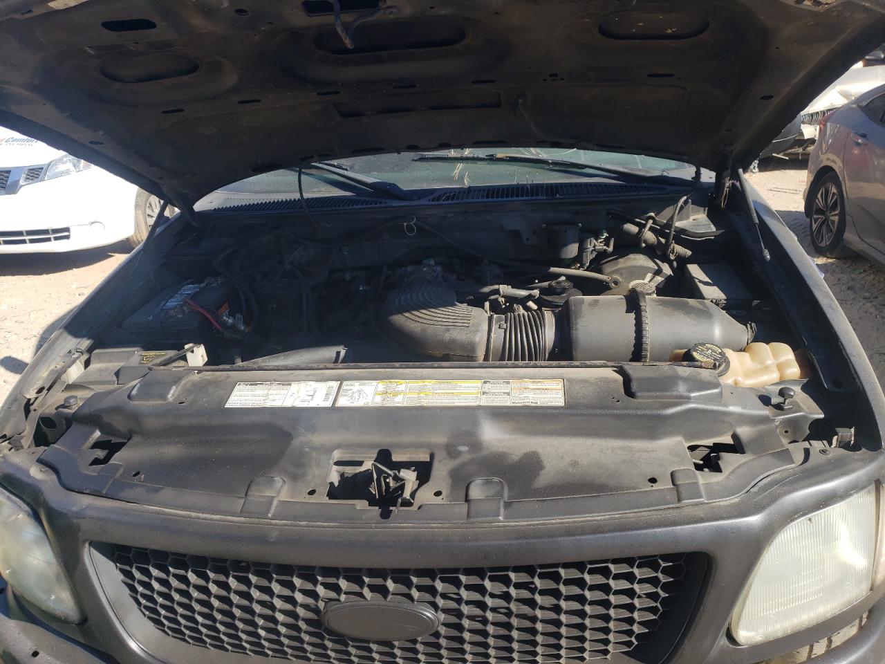 Photo 7 from auction – 2000 FORD F150 with VIN 1FTRX17L1YNA52812