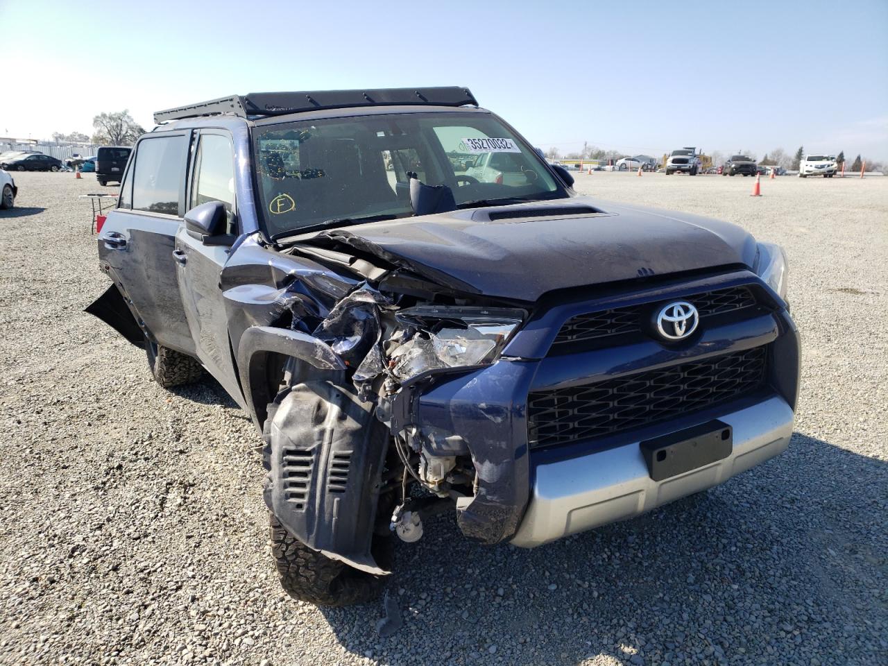 TOYOTA 4RUNNER SR 2019 with VIN JTEBU5JRXK5665058 - Photo from auction