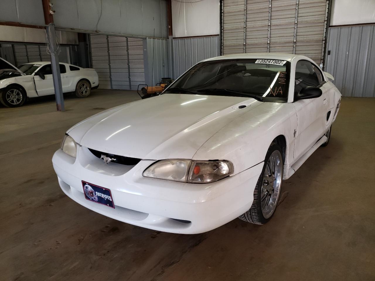 Photo 2 from auction – 1997 FORD MUSTANG with VIN 1FALP4041VF120628