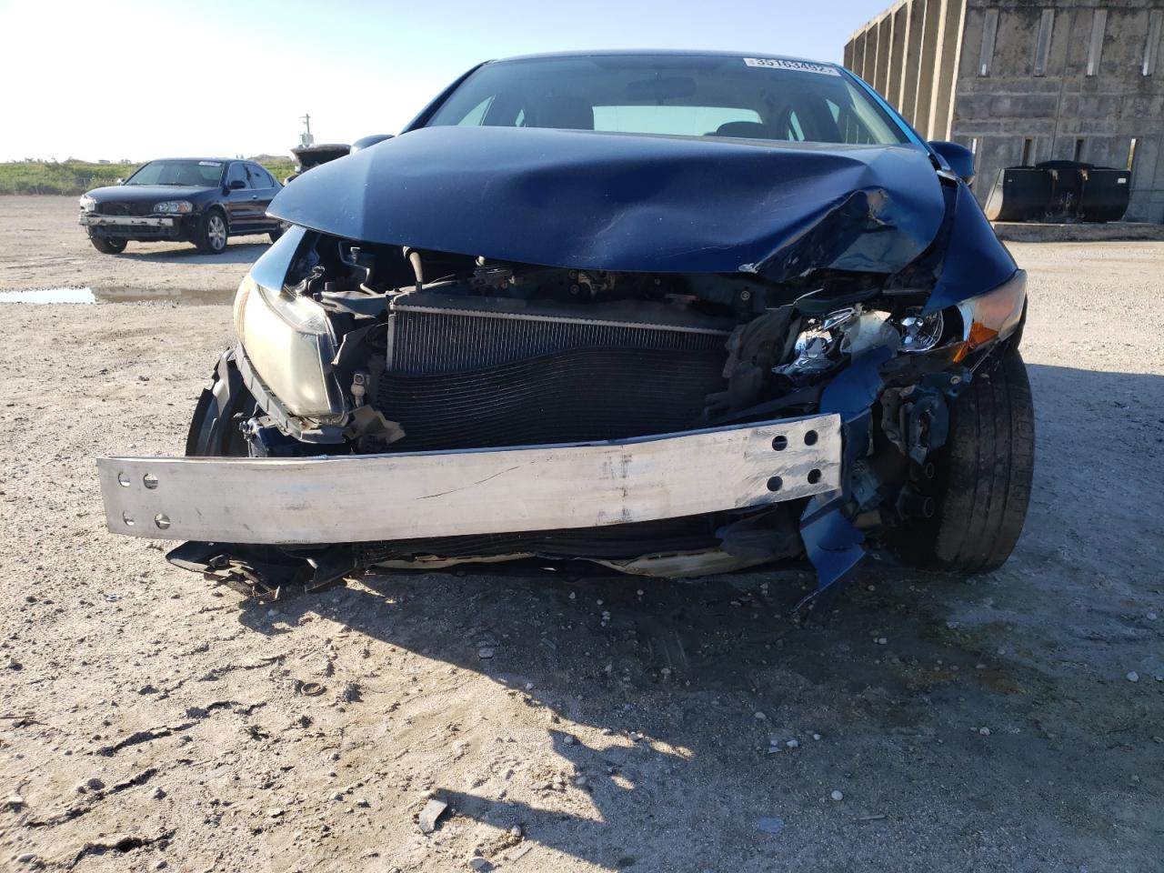 Photo 9 from auction – 2012 HONDA CIVIC LX with VIN 19XFB2F58CE035433
