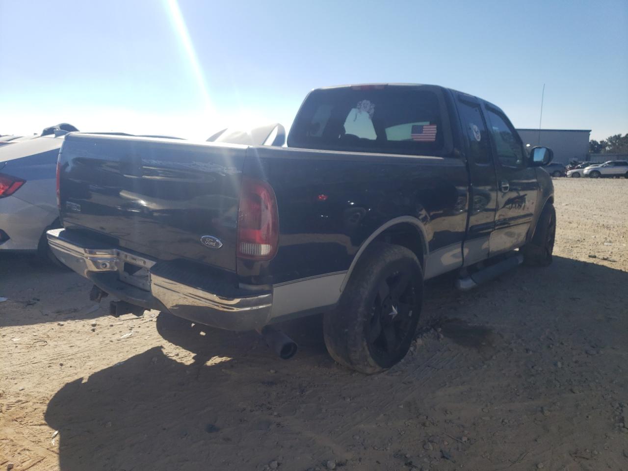 Photo 4 from auction – 2000 FORD F150 with VIN 1FTRX17L1YNA52812