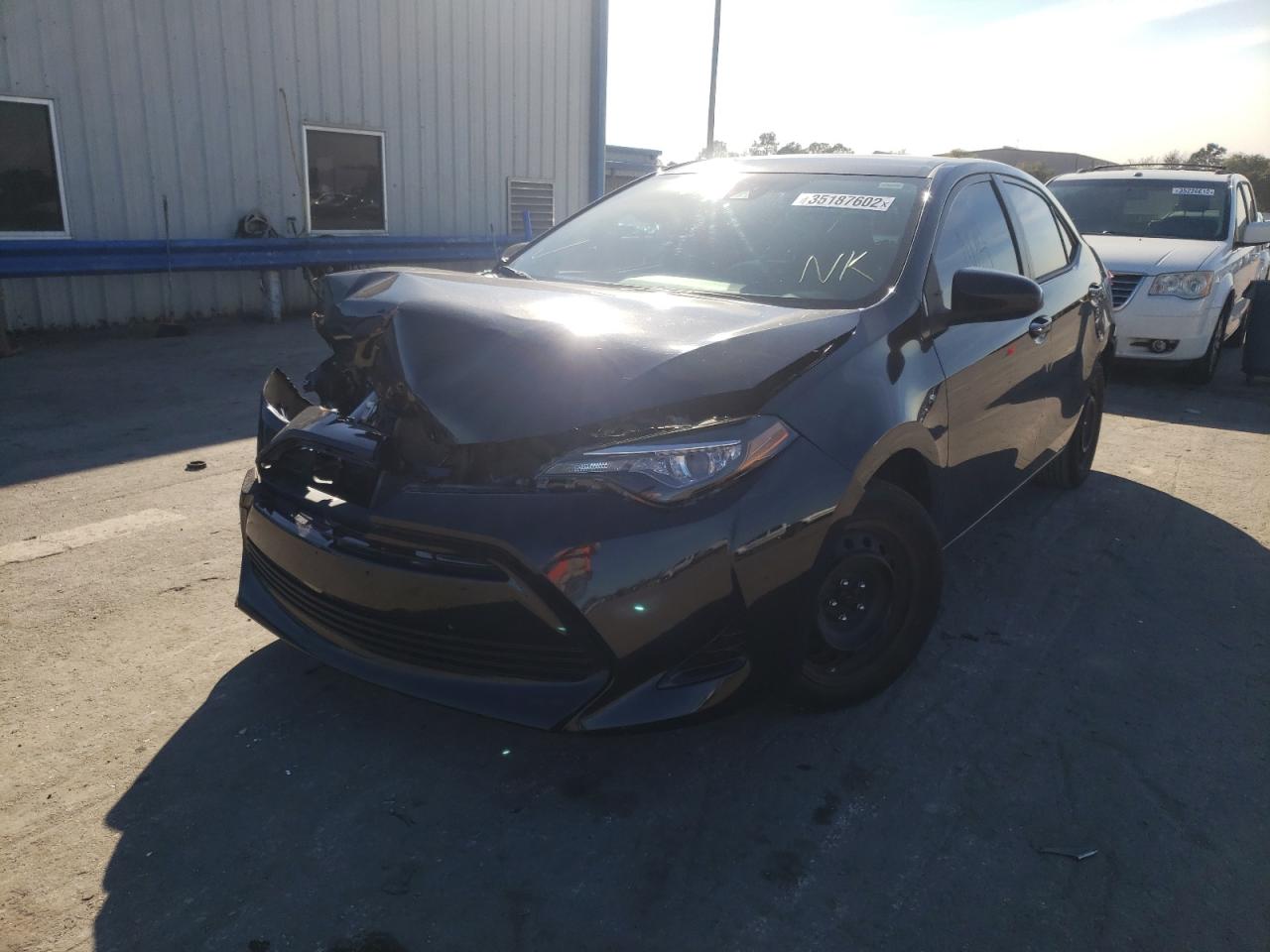 Photo 2 from auction – 2017 TOYOTA CAROLLA with VIN 5YFBURHE3HP579942
