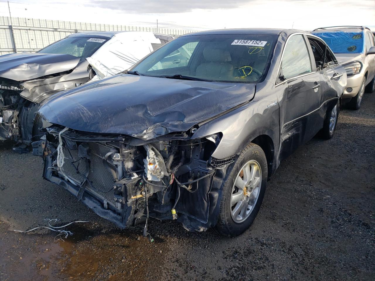Photo 2 from auction – 2011 TOYOTA CAMRY HYBR with VIN 4T1BB3EK7BU139970