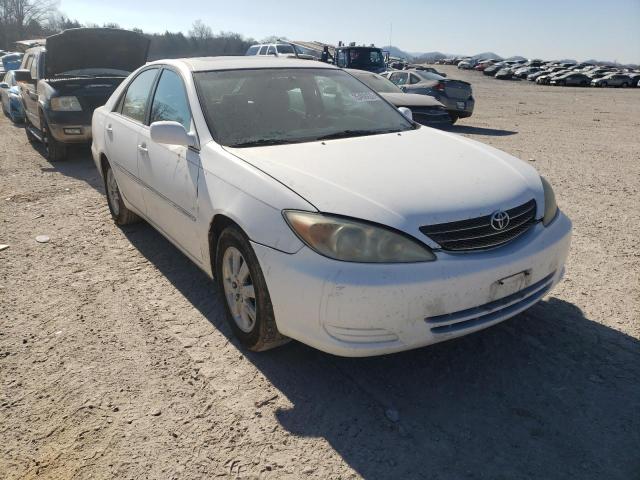 TOYOTA CAMRY LE 2002 with VIN 4T1BE30K32U100808 - Photo from auction