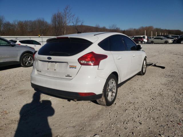 Photo 4 from auction – 2016 FORD FOCUS SE with VIN 1FADP3K29GL216733