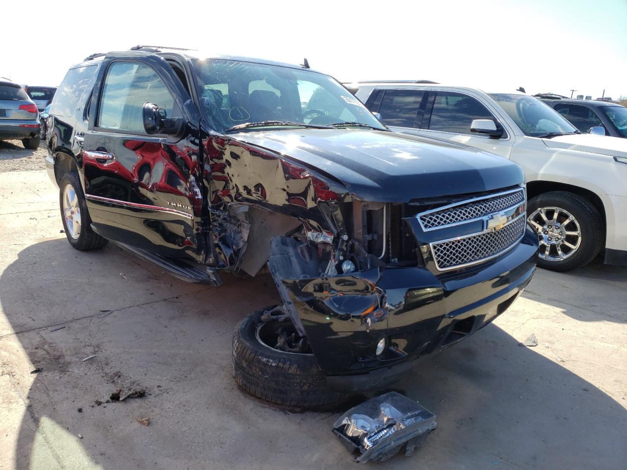 CHEVROLET TAHOE C150 2011 with VIN 1GNSCCE05BR212022 - Photo from auction