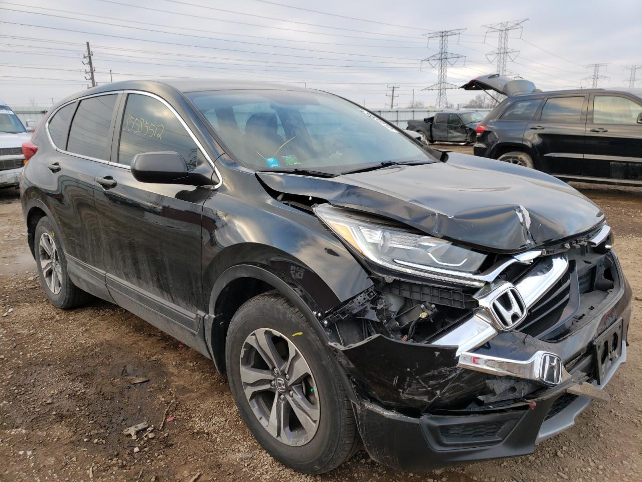 HONDA CR-V LX 2017 with VIN 7FARW5H32HE010791 - Photo from auction