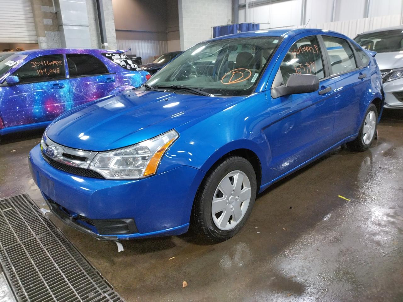 Photo 2 from auction – 2011 FORD FOCUS S with VIN 1FAHP3EN3BW117792