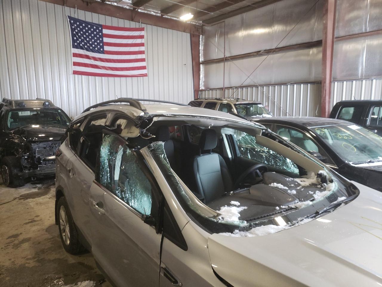 Photo 9 from auction – 2018 FORD ESCAPE SE with VIN 1FMCU9GD8JUC68069
