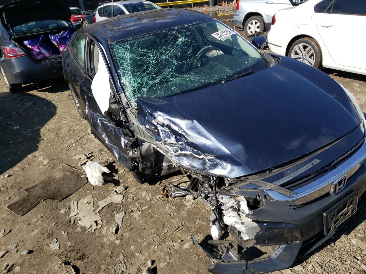 Photo 9 from auction – 2016 HONDA CIVIC EX with VIN 19XFC2F77GE231495