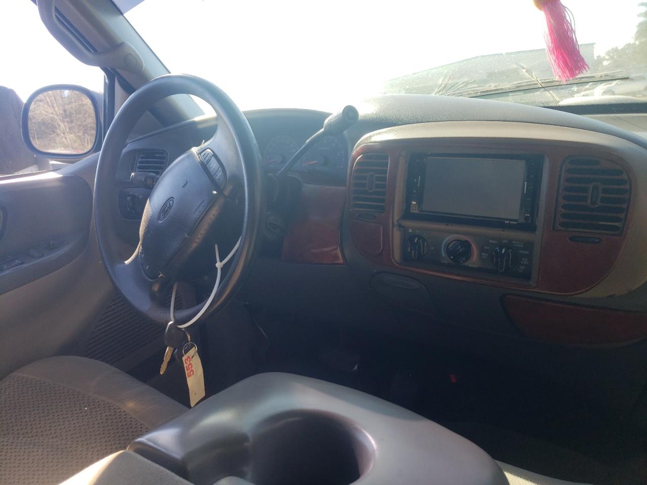 Photo 9 from auction – 2000 FORD F150 with VIN 1FTRX17L1YNA52812