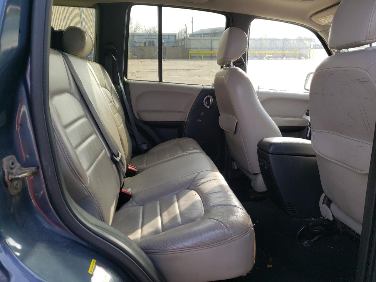 Photo 6 from auction – 2002 JEEP LIBERTY LI with VIN 1J8GL58K02W202550