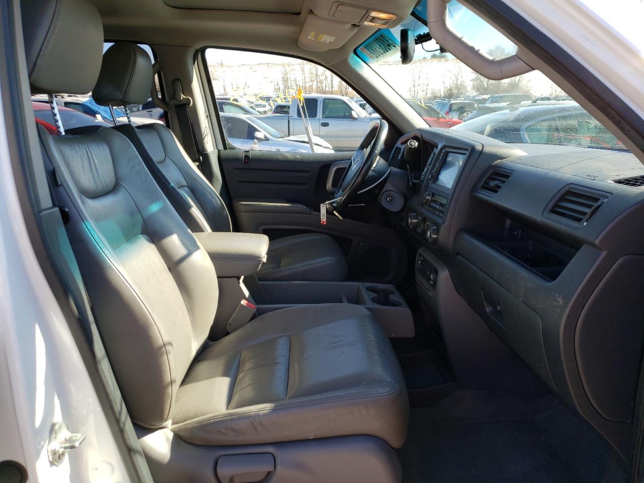 Photo 5 from auction – 2012 HONDA RIDGELINE with VIN 5FPYK1F58CB458534