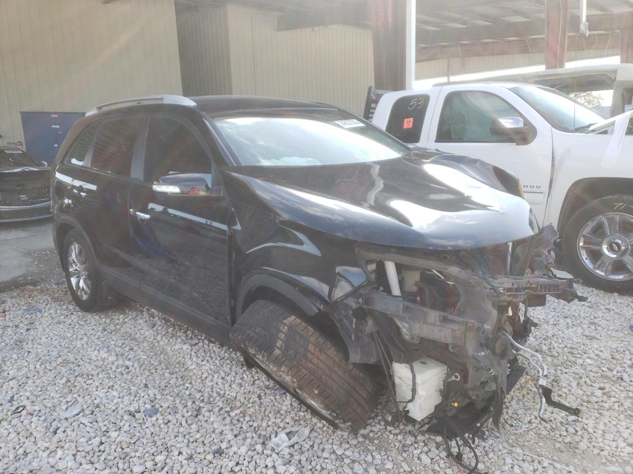 KIA SORENTO EX 2011 with VIN 5XYKU3A19BG035574 - Photo from auction