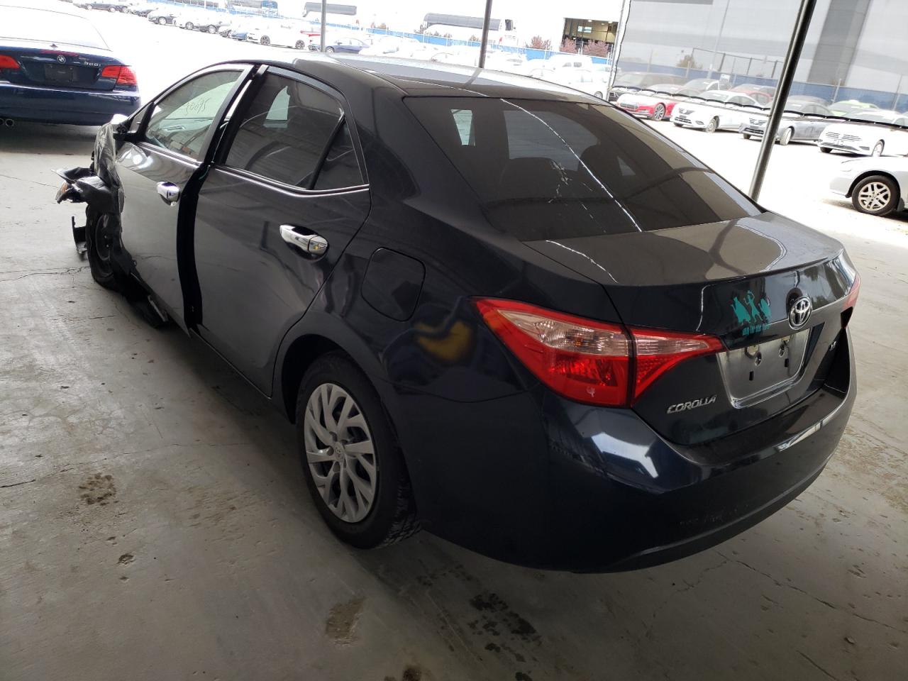 Photo 3 from auction – 2017 TOYOTA COROLLA L with VIN 5YFBURHE0HP697981