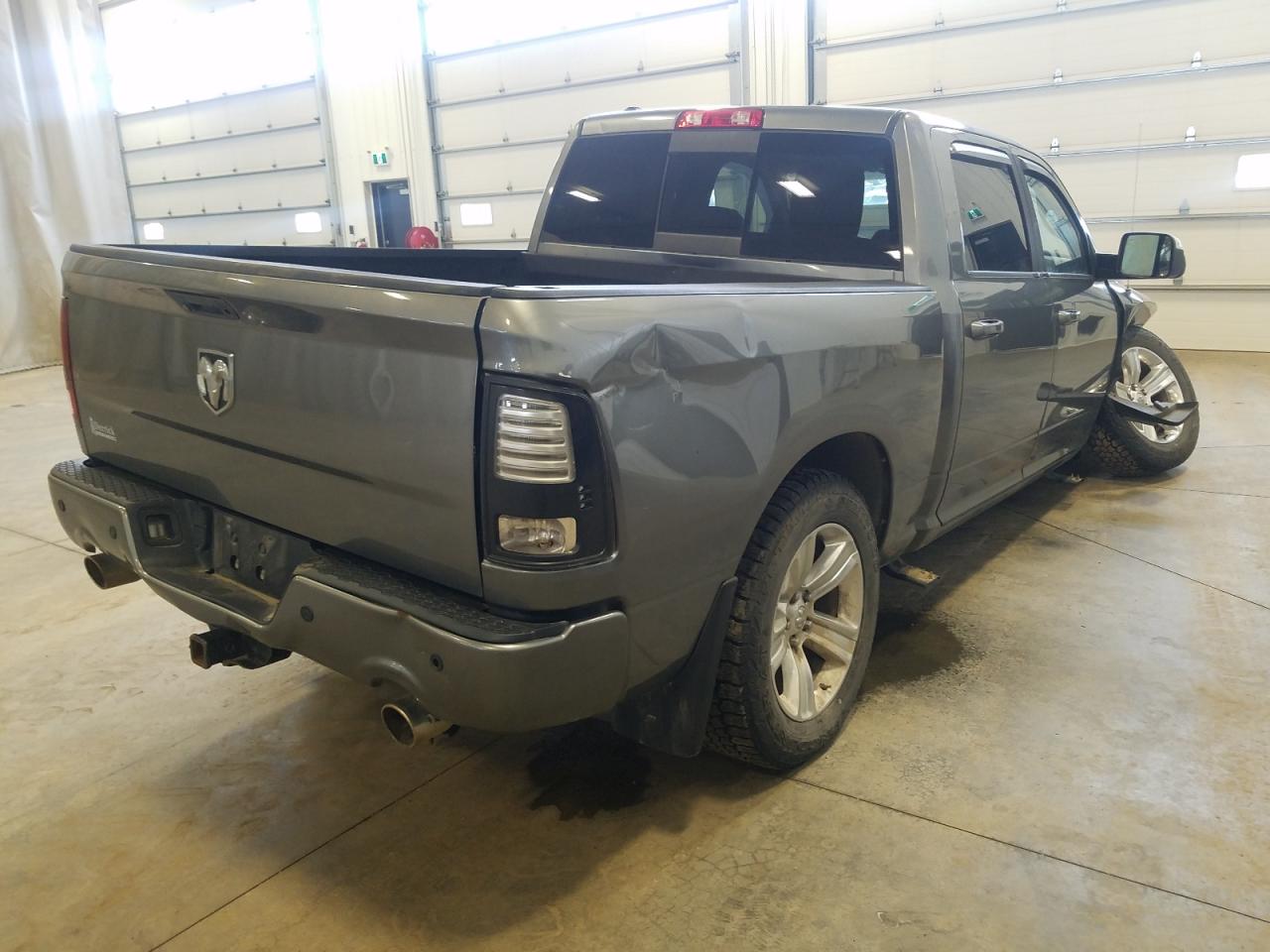 Photo 4 from auction – 2013 RAM 1500 with VIN 1C6RR7MT9DS534559