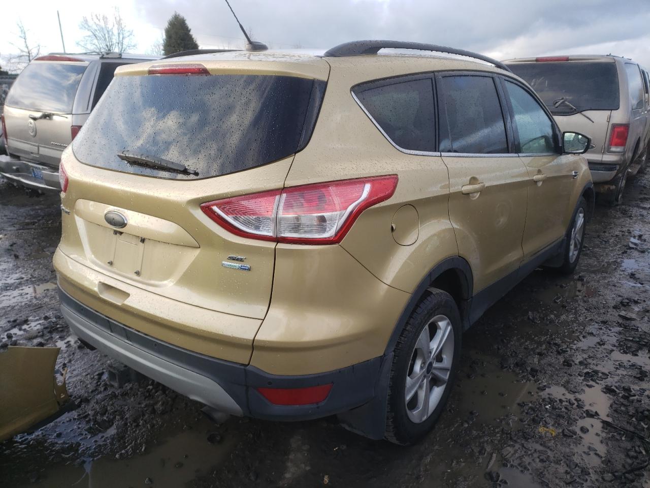 Photo 4 from auction – 2014 FORD ESCAPE SE with VIN 1FMCU9G99EUD34596