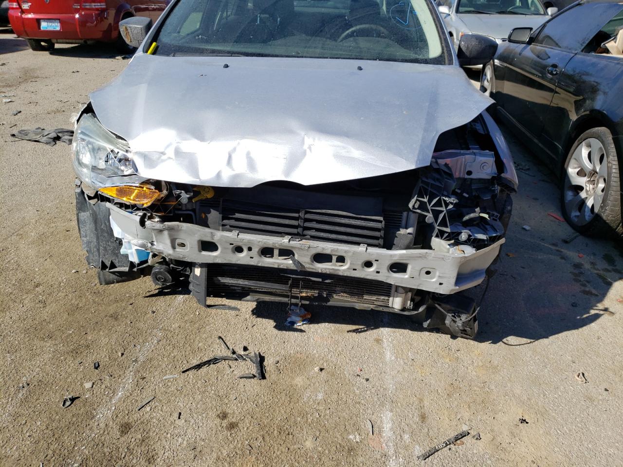 Photo 9 from auction – 2014 FORD FOCUS S with VIN 1FADP3E25EL397600