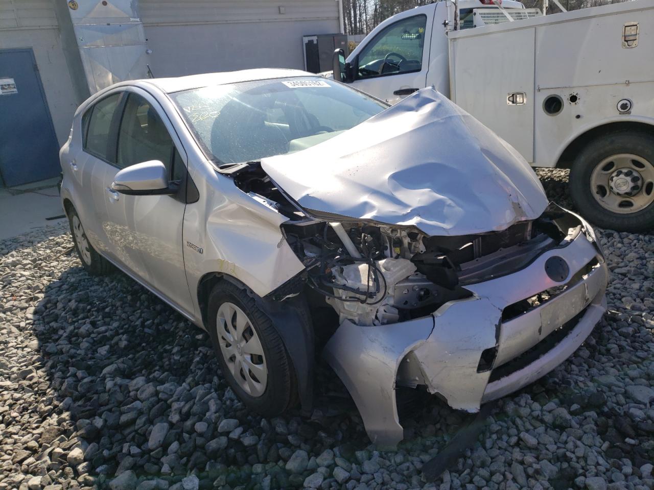 TOYOTA PRIUS C 2012 with VIN JTDKDTB35C1509988 - Photo from auction