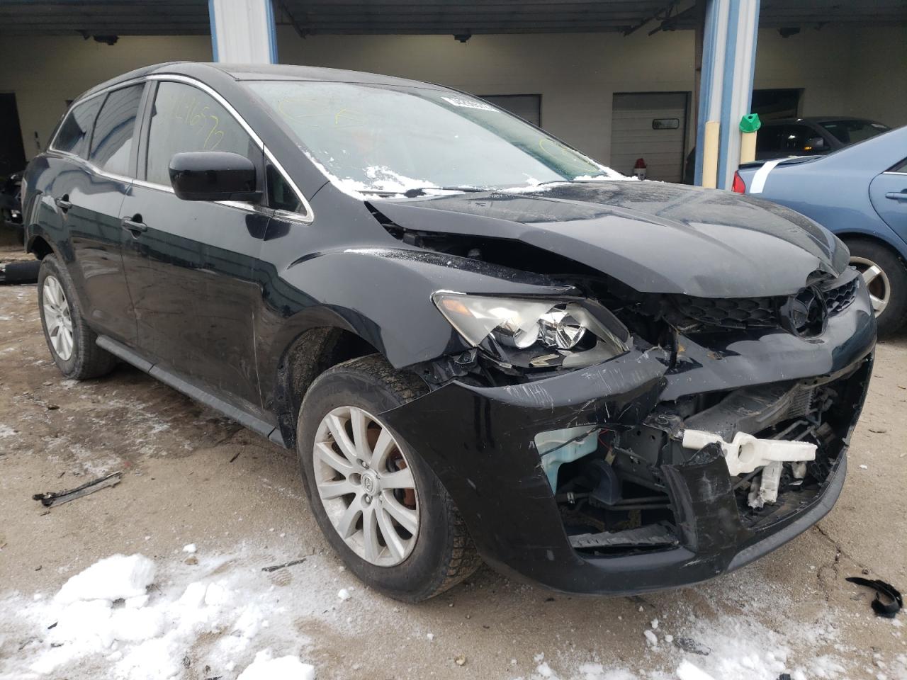 MAZDA CX-7 2011 with VIN JM3ER2B51B0385059 - Photo from auction