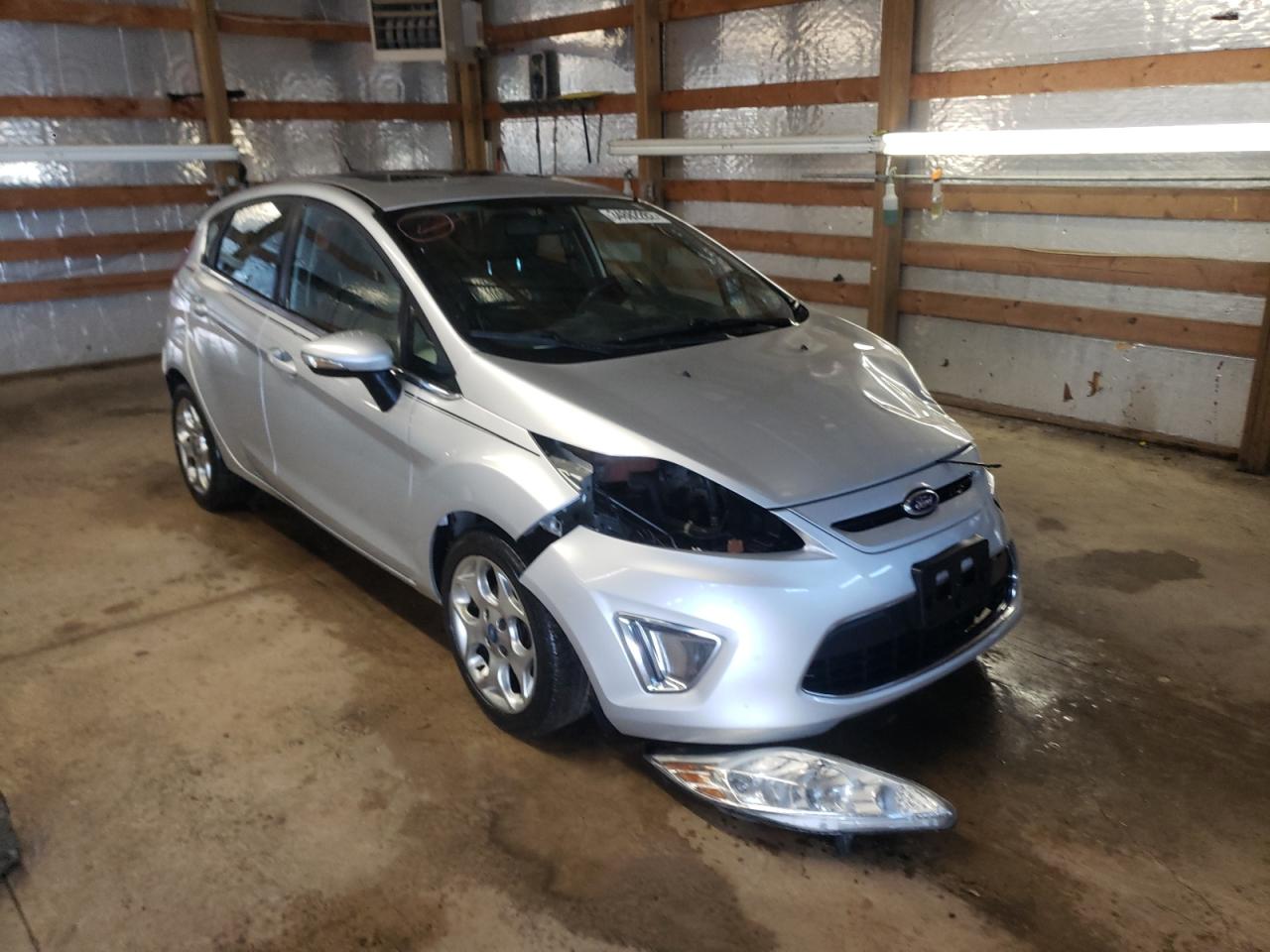FORD FIESTA TIT 2013 with VIN 3FADP4FJ2DM130875 - Photo from auction
