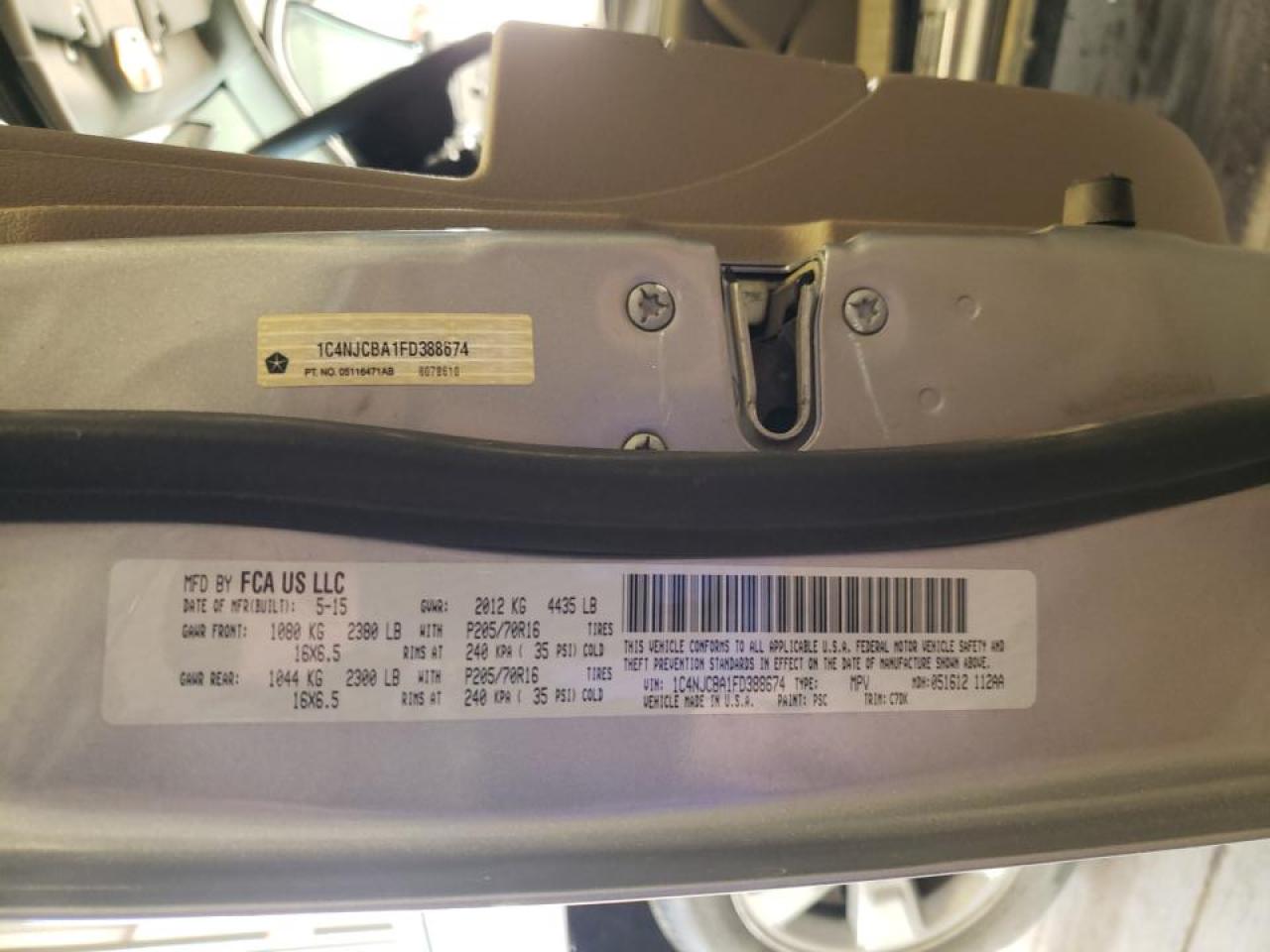 Photo 10 from auction – 2015 JEEP COMPASS SP with VIN 1C4NJCBA1FD388674