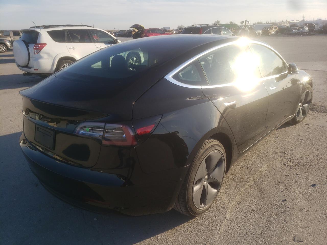 Photo 4 from auction – 2019 TESLA MODEL 3 with VIN 5YJ3E1EA4KF297820
