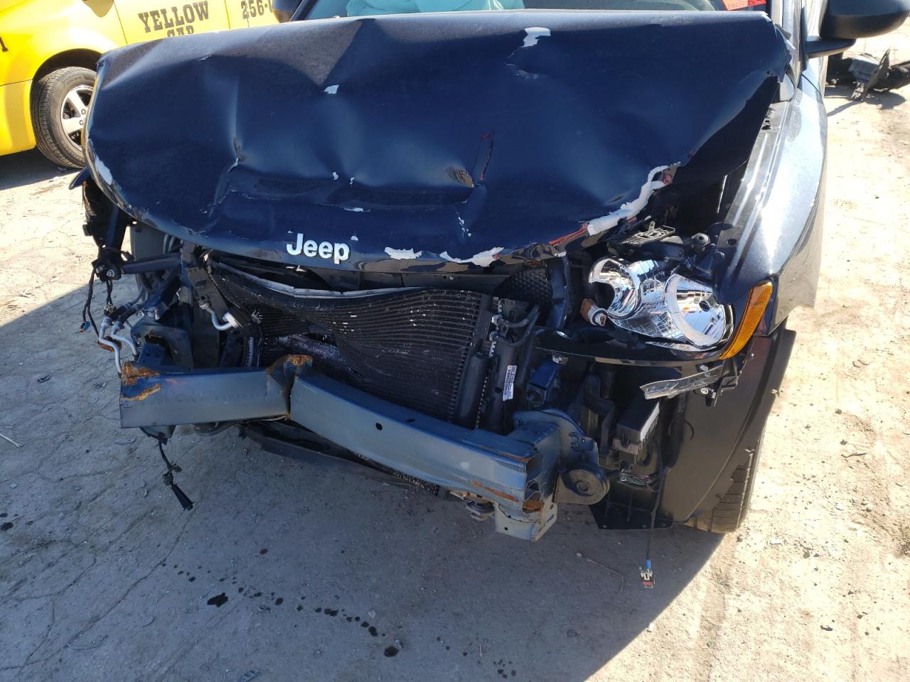 Photo 9 from auction – 2014 JEEP COMPASS SP with VIN 1C4NJCBA4ED694735