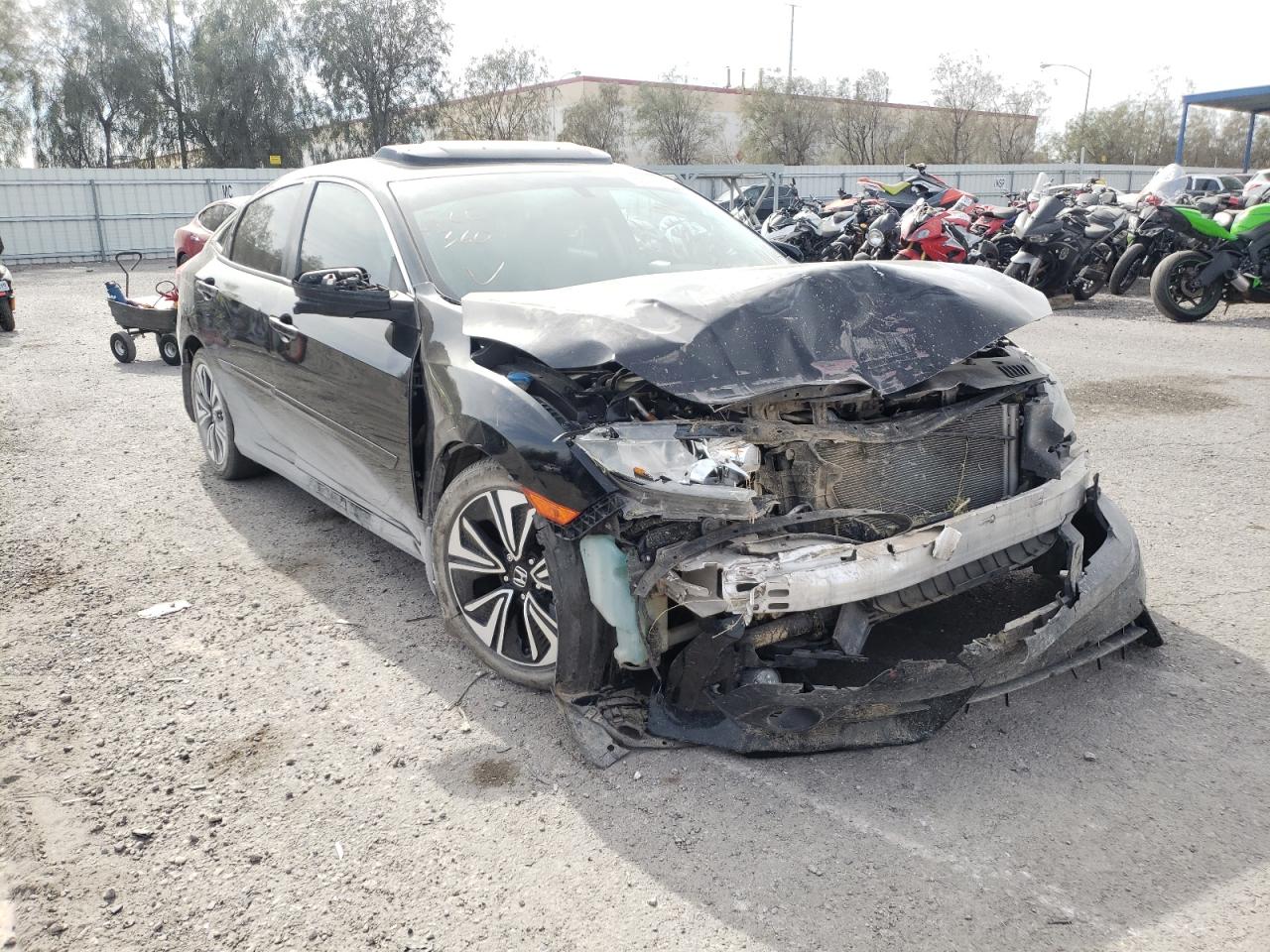 HONDA CIVIC EX 2016 with VIN 19XFC1F30GE004463 - Photo from auction