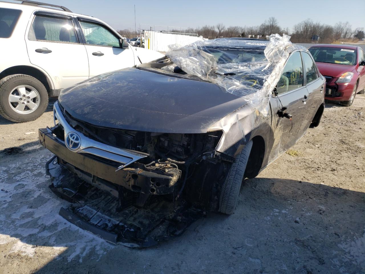 Photo 2 from auction – 2014 TOYOTA CAMRY HYBR with VIN 4T1BD1FK3EU133956